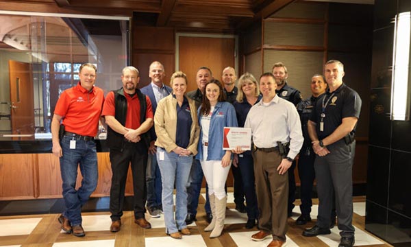 Patriot Mobile at Grapevine Police Donation - Moms for America Media & News